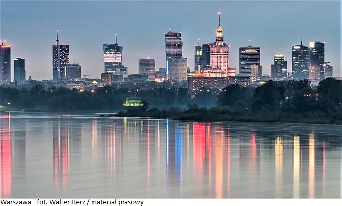 Night panorama of Warsaw skyline, Poland, over Vistula river in the night