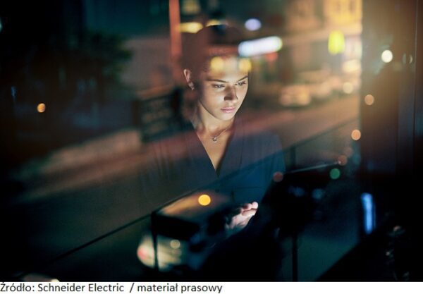 Shot of a young businesswoman using a digital tablet during a late night in a modern office