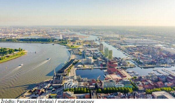 Antwerp, Belgium. Flying over the roofs of the historic city. Schelde (Esco) river. Industrial area of the city, Aerial View