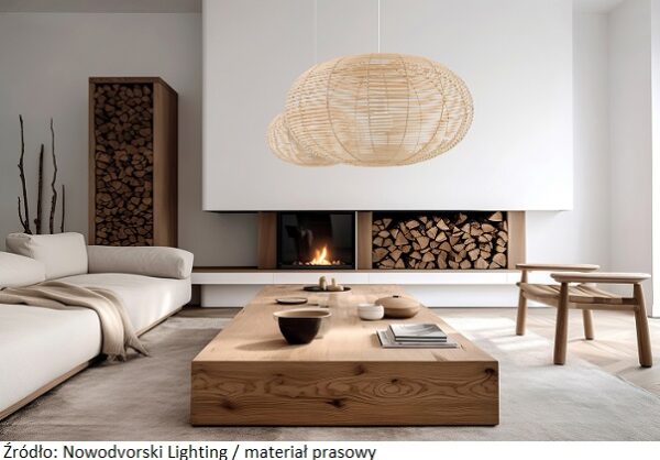 White sofa with blanket and wooden coffee table against fireplace with firewood stack. Minimalist scandinavian home interior design of modern living room. Created with generative AI technology.